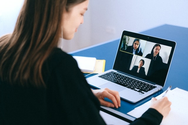 Girl have class with her teachers through online